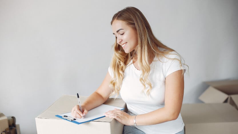 Woman Looking At Shipping Cost